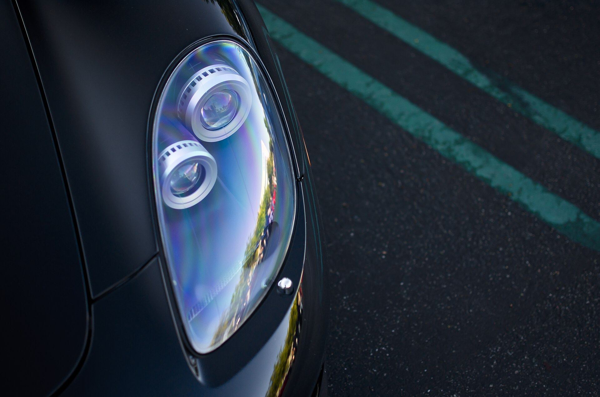 Close-up photo of a Porsche Carrera GT headlight